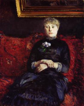 古斯塔夫 卡裡伯特 Woman Sitting on a Red Flowered Sofa